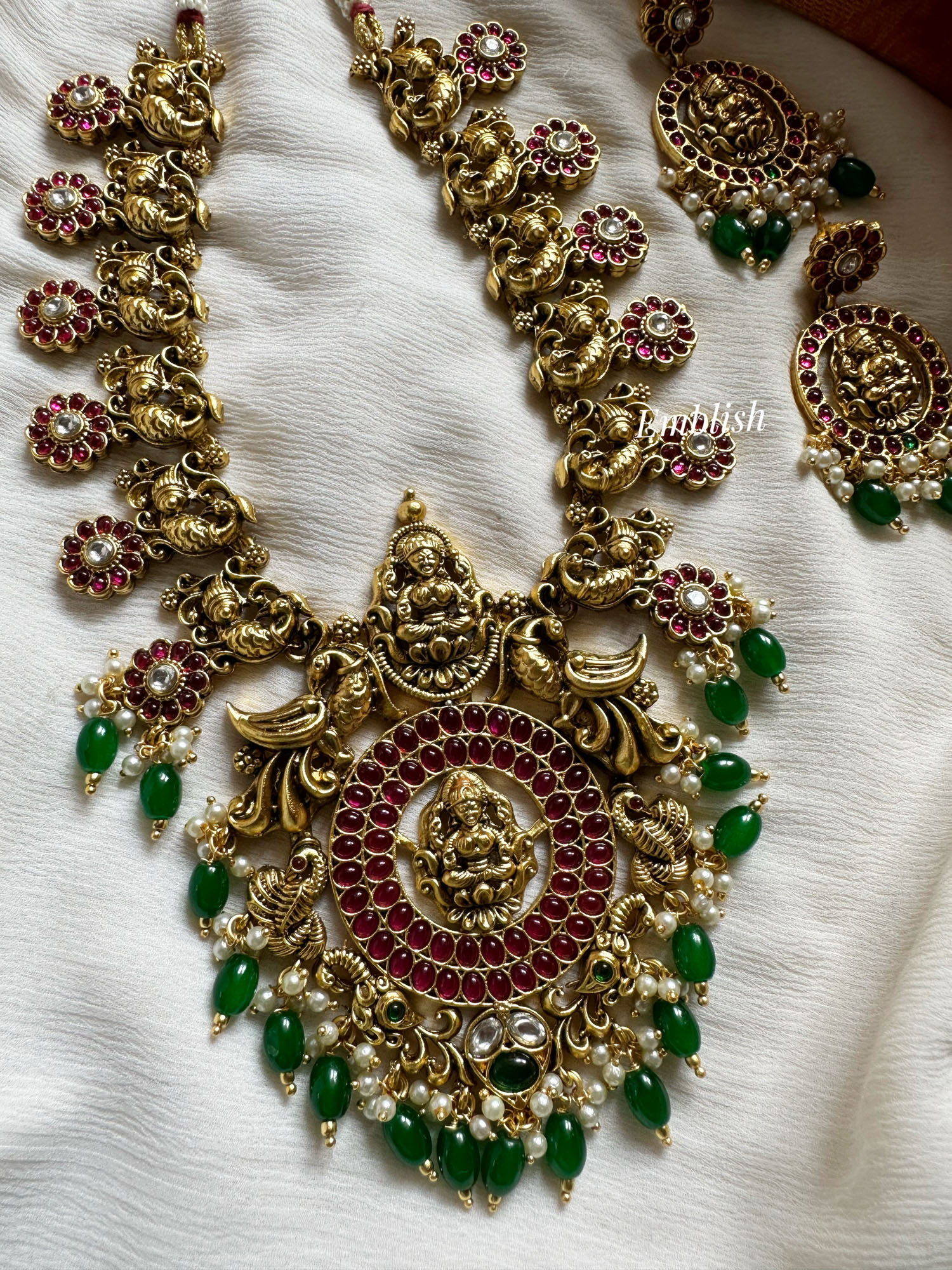 Antique Gold alike Grand Lakshmi with Peacock Short Neckpiece - Green Beads	